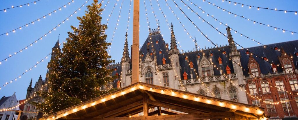 Christmas tree and lights at a market in Bruges, Belgium