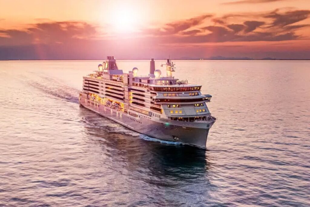 Cruise ship sailing with the sunset in the background