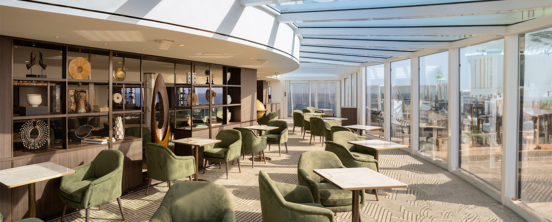 A sunny lounge aboard Explora Journeys